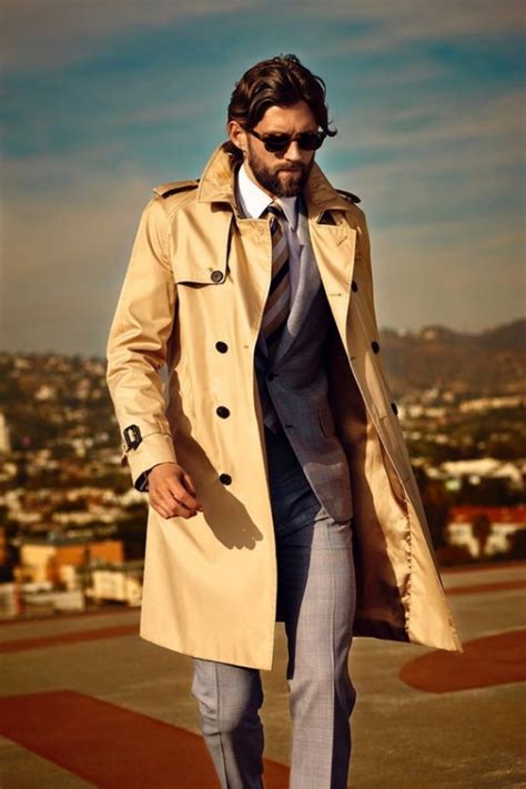 guy wearing trench coat|man wearing trench coat.